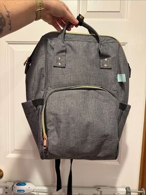 Stylish Gray Baby Diaper Backpack with Gold Accents